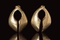 BRONZE AGE MATCHED PAIR OF GOLD EARRINGS