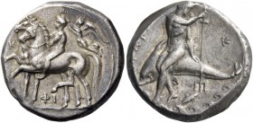 Calabria, Tarentum. Nomos circa 340-335, AR 7.84 g. Naked ephebos, crowned by Nike flying l., riding trotting horse l. and leading another beside it i...