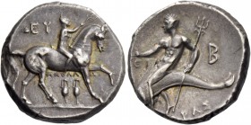 Calabria, Tarentum. Nomos circa 280-272, AR 6.46 g. Nude youth on horseback r., crowning horse that raises l. foreleg; above, EY and below, ΑΠΟΛΛΩ and...