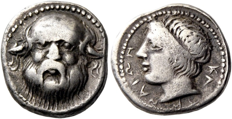 Catana. Drachm circa 410-405, AR 4.12 g. Head of Silenus facing. Rev. Head of ri...
