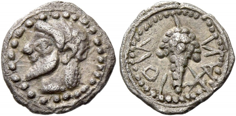 Naxos. Litra circa 550-530, AR 0.84 g. Bearded and ivy wreathed of Dionysus l. R...