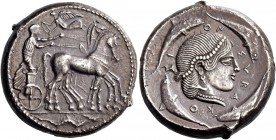 Syracuse. Tetradrachm circa 470-466, AR 17.13 g. Slow quadriga driven r. by charioteer holding reins and kentron; above, Nike flying l. to crown him. ...