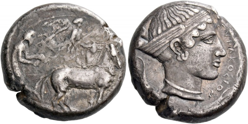 Syracuse. Tetradrachm circa 430, AR 17.22 g. Slow quadriga driven r. by chariote...