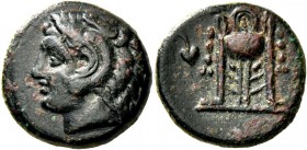 Philippi. Bronze circa 356-345, Æ 5.04 g. Head of Heracles l., wearing lion skin headdress. Rev. Filleted tripod; in l. field, ivy leaf. BMC 8 var. (w...
