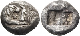 Time of Croesus, 561-546 or later. Siglos Sardes circa 561-546, AR 5.00 g. Confronted foreparts of lion, with extended r. foreleg, and bull. Rev. Bipa...