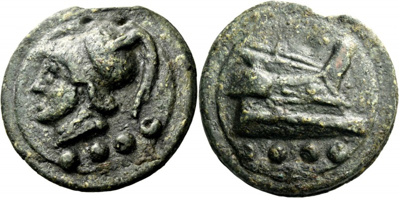Triens circa 225-217, Æ 81.32 g. Helmeted head of Minerva l.; below, four pellet...