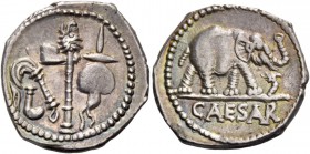 C. Iulius Caesar. Denarius, mint moving with Caesar 49-48, AR 3.71 g. Pontifical emblems: culullus, aspergillum, axe and apex. Rev. Elephant r., tramp...