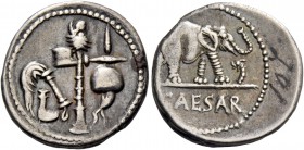 C. Iulius Caesar. Denarius, mint moving with Caesar 49-48, AR 3.71 g. Pontifical emblems: culullus, aspergillum, axe and apex. Rev. Elephant r., tramp...