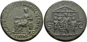 Gaius augustus, 37 – 41. Sestertius 37-38, Æ 25.62 g. Pietas, veiled and draped, seated l., holding patera and resting l. arm on small facing figure. ...
