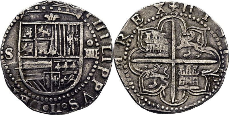 FELIPE II. Sevilla. 4 reales. (Anterior al 1586). D cuadrada. Gran lis entre cor...