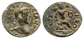 Volusian (251-253). Cilicia, Syedra. Æ (17mm, 3.22g, 6h). Laureate, draped and cuirassed bust r. R/ Hephaestus seated r., holding hammer and shield. U...