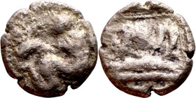 Lycaonia: Laranda (IV- III century BV) Obol. Obv:Baaltars seated left, holding grain ear, grape bunch, and scepter. Rev: Forepart of wolf right;