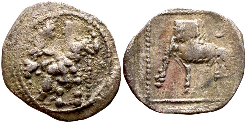 Lycaonia: Laranda (IV- III century BV) Obol. Obv:Baaltars seated left, holding g...