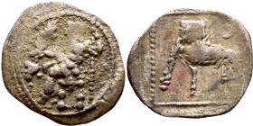 Lycaonia: Laranda (IV- III century BV) Obol. Obv:Baaltars seated left, holding grain ear, grape bunch, and scepter. Rev: Forepart of wolf right;