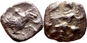 Lycaonia: Laranda (IV- III century BV) Obol. Obv:Baaltars seated left, holding grain ear, grape bunch, and scepter. Rev: Forepart of wolf right;