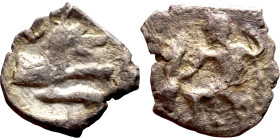 Lycaonia: Laranda (IV- III century BV) Obol. Obv:Baaltars seated left, holding grain ear, grape bunch, and scepter. Rev: Forepart of wolf right;