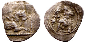 Lycaonia: Laranda (IV- III century BV) Obol. Obv:Baaltars seated left, holding grain ear, grape bunch, and scepter. Rev: Forepart of wolf right;