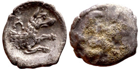 Lycaonia: Laranda (IV- III century BV) Obol. Obv:Baaltars seated left, holding grain ear, grape bunch, and scepter. Rev: Forepart of wolf right;