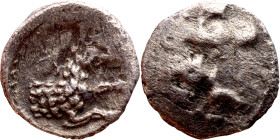 Lycaonia: Laranda (IV- III century BV) Obol. Obv:Baaltars seated left, holding grain ear, grape bunch, and scepter. Rev: Forepart of wolf right;