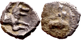 Lycaonia: Laranda (IV- III century BV) Obol. Obv:Baaltars seated left, holding grain ear, grape bunch, and scepter. Rev: Forepart of wolf right;