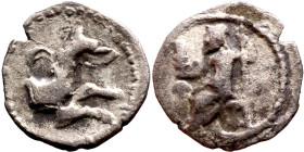 Lycaonia: Laranda (IV- III century BV) Obol. Obv:Baaltars seated left, holding grain ear, grape bunch, and scepter. Rev: Forepart of wolf right;