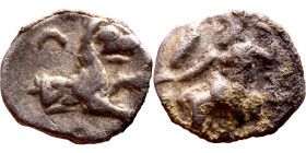 Lycaonia: Laranda (IV- III century BV) Obol. Obv:Baaltars seated left, holding grain ear, grape bunch, and scepter. Rev: Forepart of wolf right;