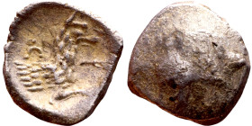 Lycaonia: Laranda (IV- III century BV) Obol. Obv:Baaltars seated left, holding grain ear, grape bunch, and scepter. Rev: Forepart of wolf right;