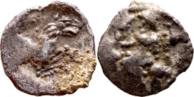 Lycaonia: Laranda (IV- III century BV) Obol. Obv:Baaltars seated left, holding grain ear, grape bunch, and scepter. Rev: Forepart of wolf right;