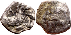 Lycaonia: Laranda (IV- III century BV) Obol. Obv:Baaltars seated left, holding grain ear, grape bunch, and scepter. Rev: Forepart of wolf right;