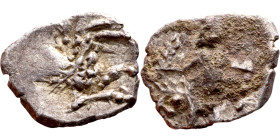 Lycaonia: Laranda (IV- III century BV) Obol. Obv:Baaltars seated left, holding grain ear, grape bunch, and scepter. Rev: Forepart of wolf right;