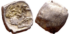 Lycaonia: Laranda (IV- III century BV) Obol. Obv:Baaltars seated left, holding grain ear, grape bunch, and scepter. Rev: Forepart of wolf right;