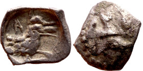 Lycaonia: Laranda (IV- III century BV) Obol. Obv:Baaltars seated left, holding grain ear, grape bunch, and scepter. Rev: Forepart of wolf right;