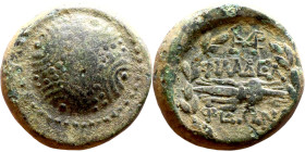 Lydia: Philadelphia (II – I centuries BC) bronze. Obv: Macedonian shield Rev: Winged thunderbolt within wreath; monogram above