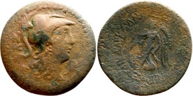Cilicia, Seleukeia (II-I century) bronze. Obv:  Helmeted head of Athena r.; monogram behind. Rev: Nike advancing l., holding wreath and palm; two mono...