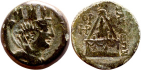 Cilicia: Tarsus (164 BC -27 BC) bronze coin. Obv: Bust of Tyche. Rev: andan standing right on horned, winged animal, within a pyramidal monument surmo...