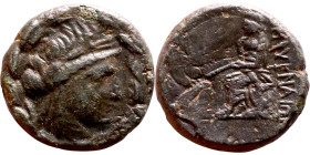 Antiochos III The Great (Seleukid King: 223-187 BC). AE bronze. Obv.: Laureate head of Apollo Rev.: Apollo seated left on omphalos, testing arrow and ...
