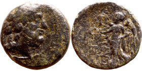 Antiochos IV Epiphanes (Seleukid King: 175-164 BC). AE bronze. Obv: Bust of Zeus. Rev: Nike walking left
