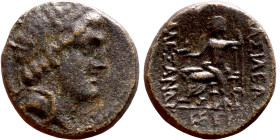 Alexander I Ballas (Seleukid king: 150-145) Bronze. Obverse: Diademed head of Alexander I right Rev: Apollo seated left on omphalos, testing arrow and...