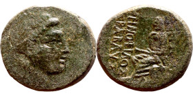 Antiochos III The Great (Seleukid King: 223-187 BC). AE bronze. Obv.: Laureate head of Apollo Rev.: Apollo seated left on omphalos, testing arrow and ...