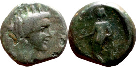 Kelenderis (BC 200-30) bronze coin. Obv:  Draped, turreted and veiled bust of Tyche right Rev: Apollo standing facing, head left, holding branch and r...