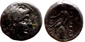 Antiochos III The Great (Seleukid King: 223-187 BC). AE bronze. Obv.: Laureate head of Apollo Rev.: Apollo seated left on omphalos, testing arrow and ...