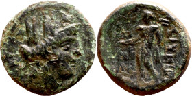 Kelenderis (BC 200-30) bronze coin. Obv:  Draped, turreted and veiled bust of Tyche right Rev: Apollo standing facing, head left, holding branch and r...