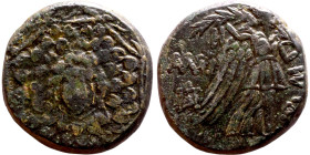 Pontus, Amisos (I century bc) bronze coin. Obv: Aegis with Gorgon's head at center Rev: Nike advancing right, holding wreath and palm branch,