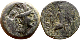 Tarsos (BC 164-27. bronze. Obv: Bust of Tyche. Rev: Zeus in himation seated left on throne, holding eagle-tipped sceptre