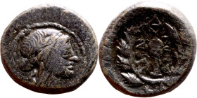 Mysia, Cyzicus (III-I Century BC) broze coin. Obv: Diademed and draped bust of Kore on right.  Rev: Legend and monogram within an oak wreath.