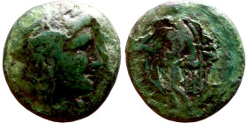 Mysia, Cyzicus (III-I Century BC) broze coin. Obv: Diademed and draped bust of Kore on right.  Rev: Legend and monogram within an oak wreath.