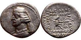 Orodes II ( Parthian King: 57-38) Drachm. Obv: Bust of King left. Rev: A king with a bow sitting on a throne, vertical and horizontal inscriptions.