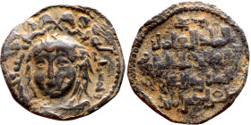 Seljuk (1037–1157, bronze coin in Byzantine style. Obverse: Bust. Reverse: Arabicc inscription