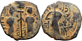 Seljuk (1037–1157, bronze coin in Byzantine style. Obverse: Two figures Reverse: standing figure