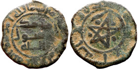 Umayyad/Abbasid. Bronze coin. Obverse: Arabic inscription. Reverse: Arabic inscription